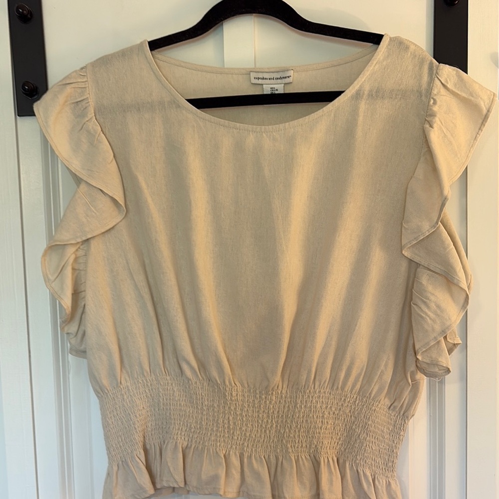 Cupcakes & Cashmere Cream Ruffled Smocked Blouse